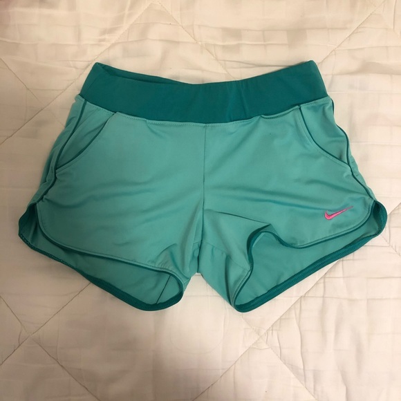 Green Nike shorts